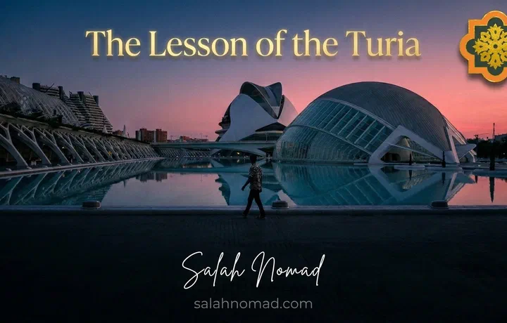 The Ciudad de las Artes y las Ciencias in Valencia at dusk, its white curves reflecting in still water, a lone figure in a zebra-striped shirt …